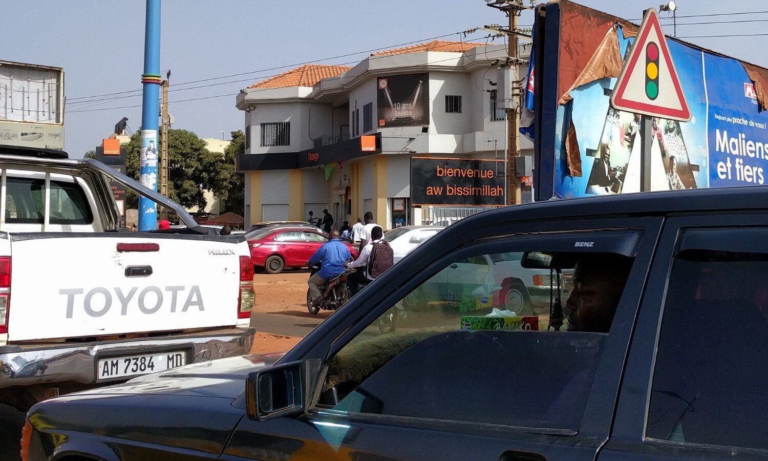 Billboard with "Aw bisimillah" written on it