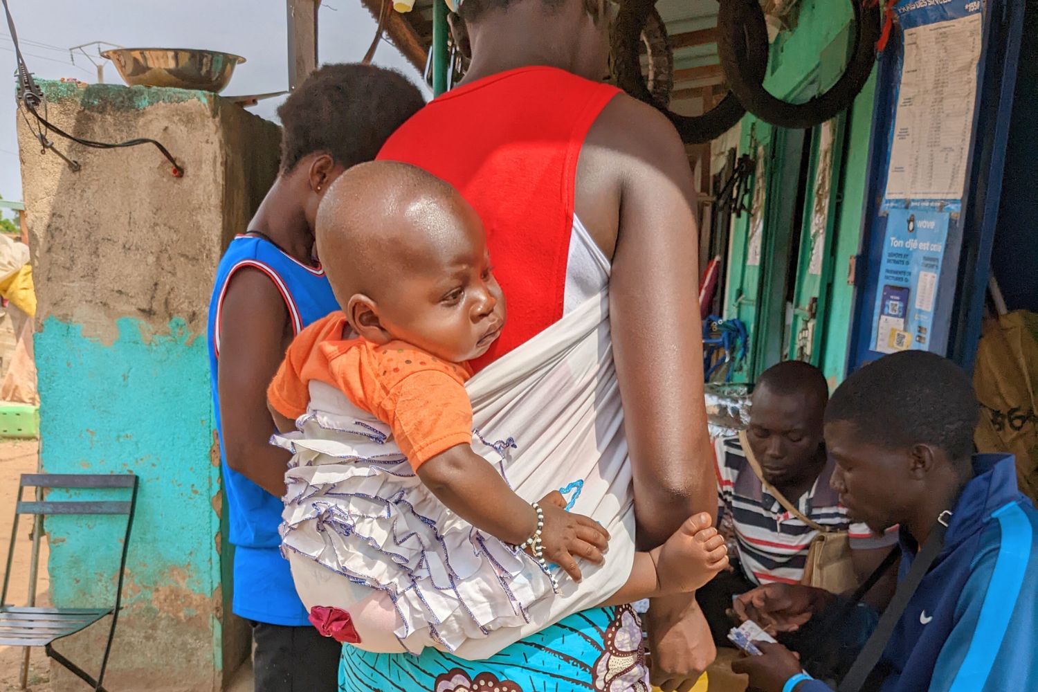 child on his mother's back